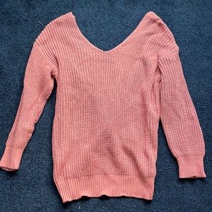 Sweater with back twist